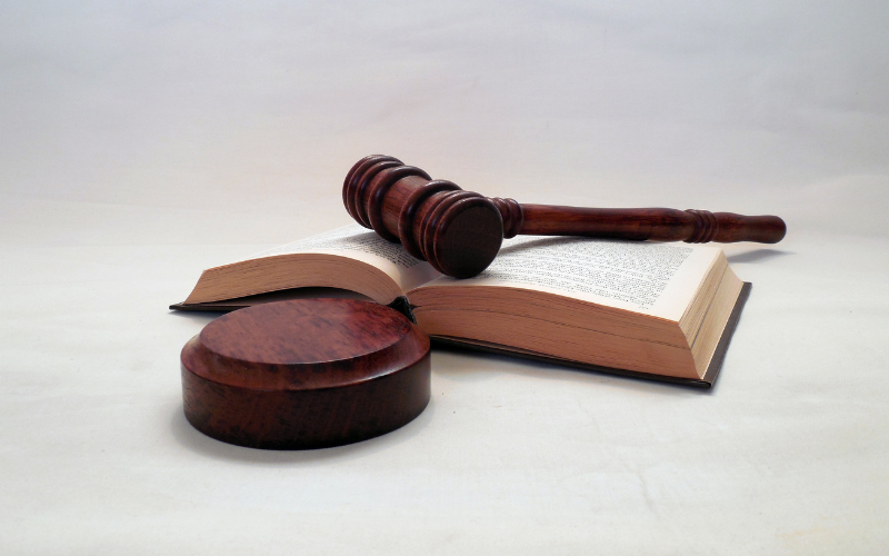 A gavel and an open book