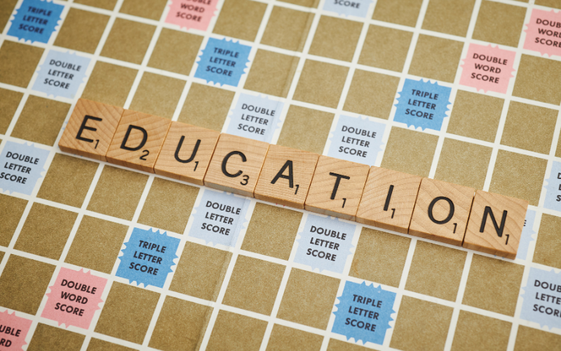 Scrabble tiles spelling the word 'education'