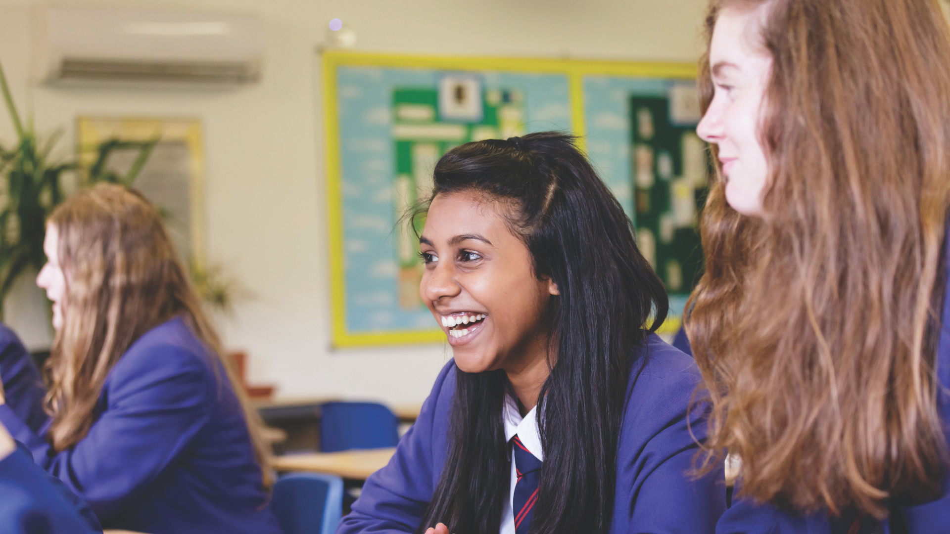 Girls laughing together